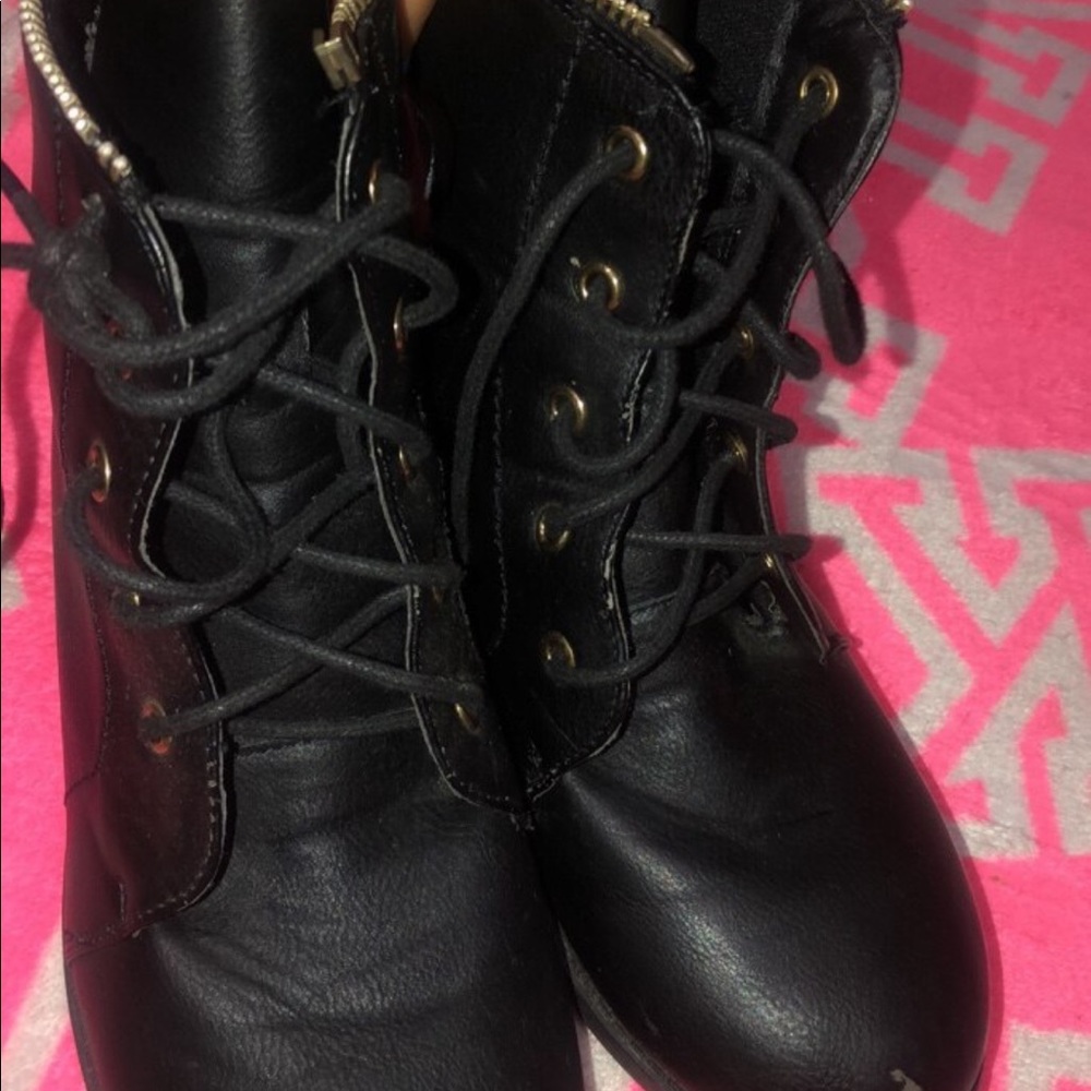 Black and gold boots